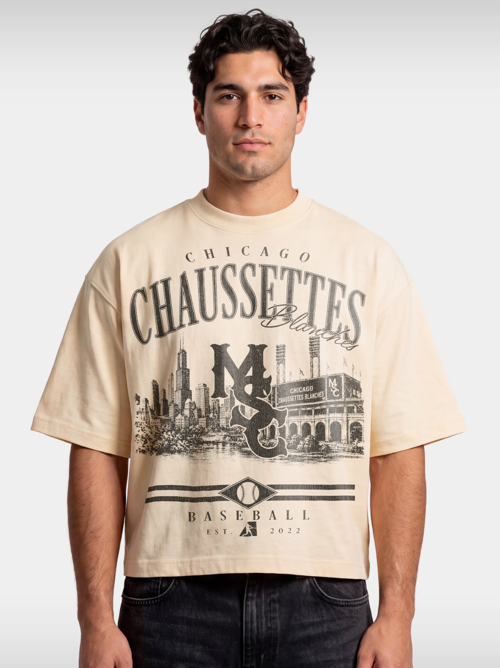 Monaco Chaussettes ivory boxy tee worn by model, front view with vintage-style baseball graphic.
