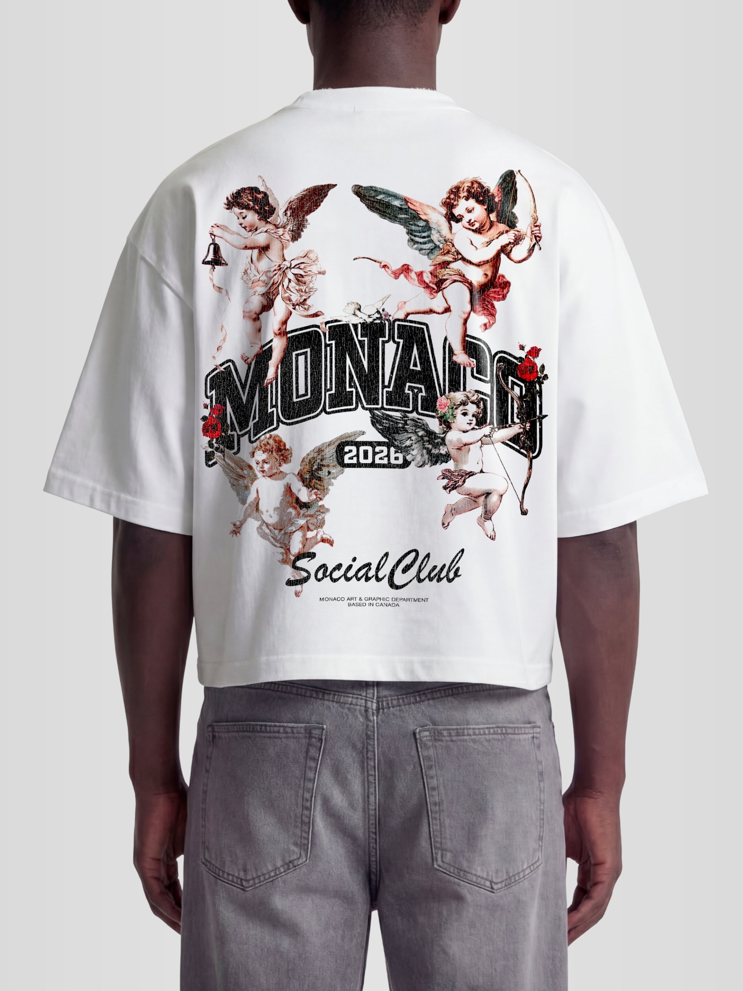 Man model wearing the Renaissance Heavyweight Boxy Tee in White with full-color Renaissance cherub and roses graphic — Monaco Social Club streetwear