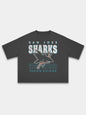 Black San Jose Sharks heavyweight boxy tee, front view with teal and white hockey graphic.