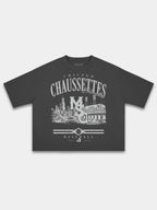 Monaco Chaussettes black heavyweight boxy tee, front view with skyline and stadium graphic.
