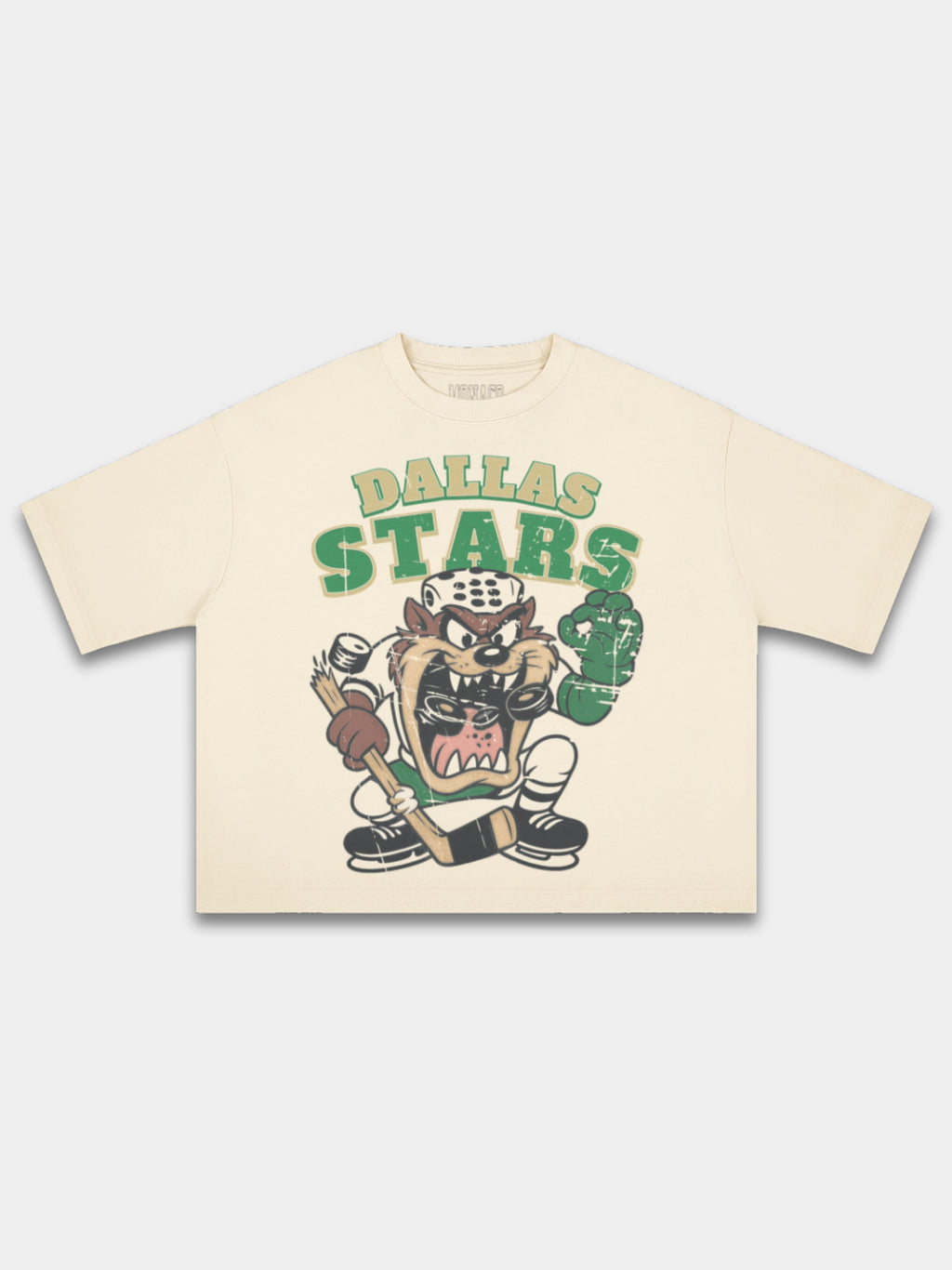Ivory Dallas Stars Taz boxy tee, front view with cartoon character in helmet and skates.