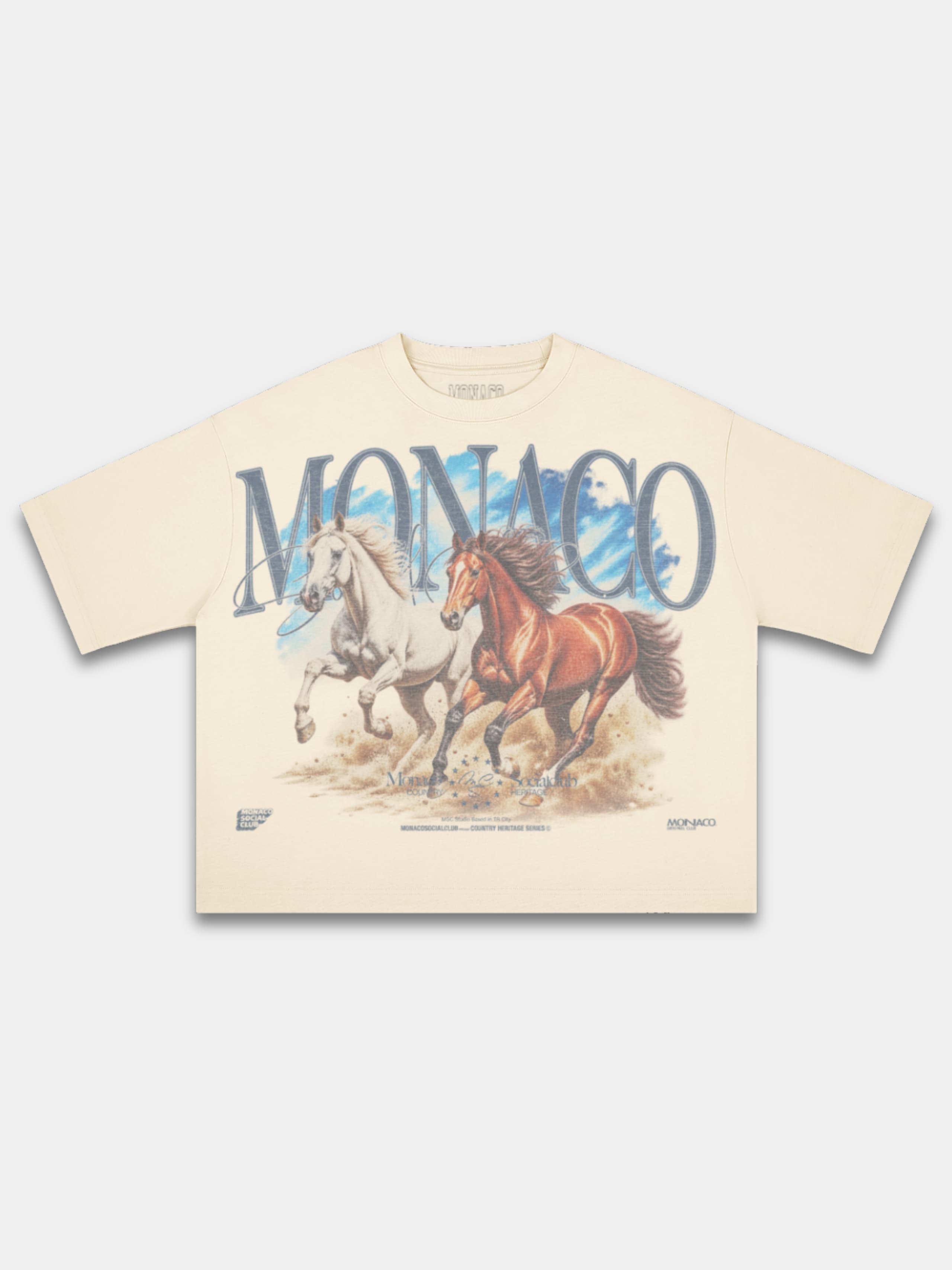 Ivory Run Wild boxy tee by Monaco, front view with vintage-style horse art and arched lettering.