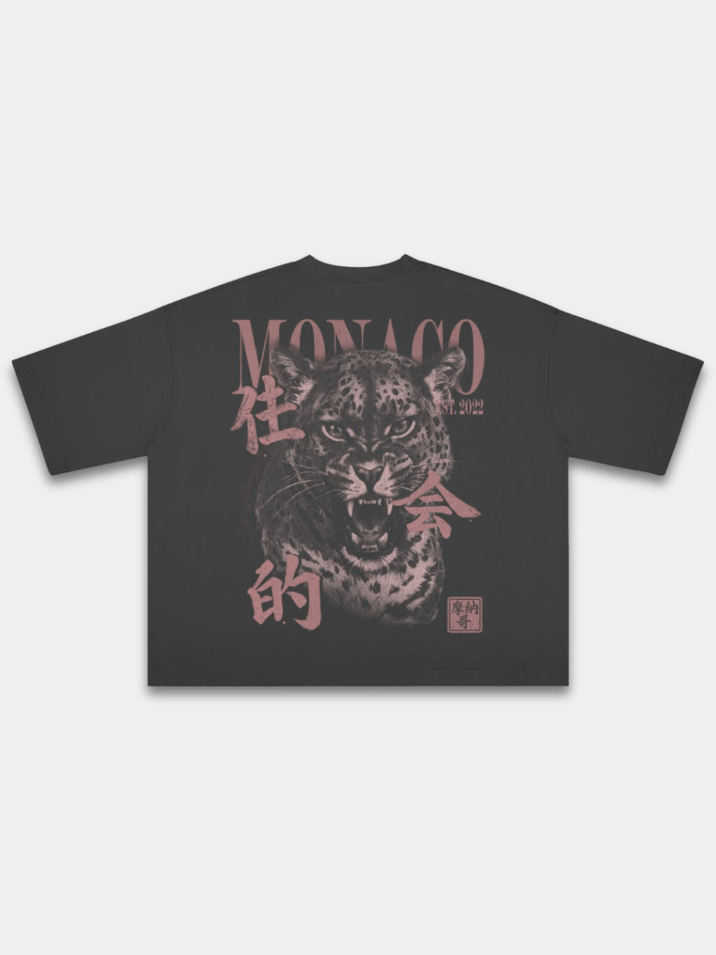 Monaco Primal Instinct black boxy tee, back view with roaring leopard graphic and MONACO lettering.