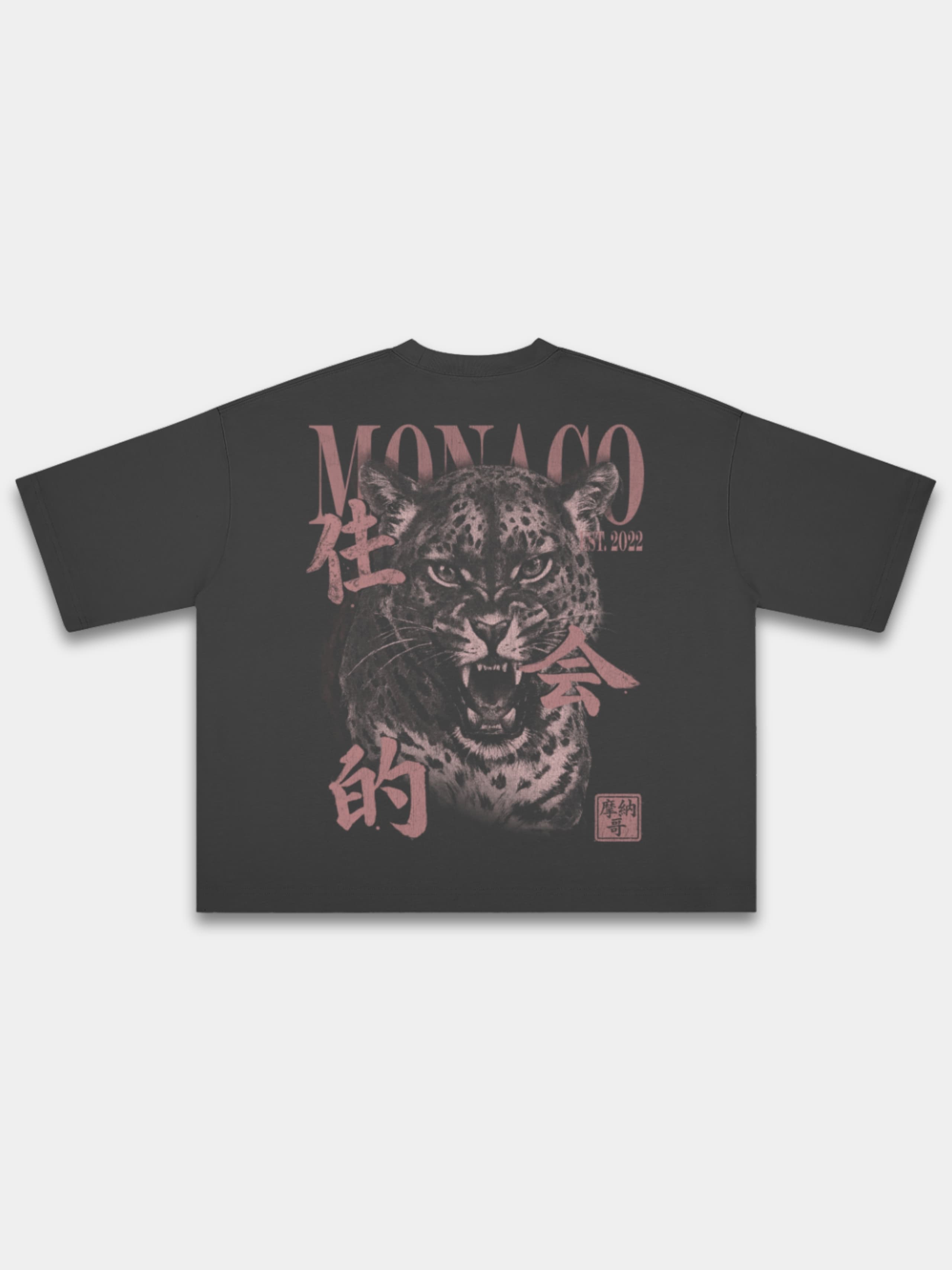 Monaco Primal Instinct black boxy tee, back view with roaring leopard graphic and MONACO lettering.