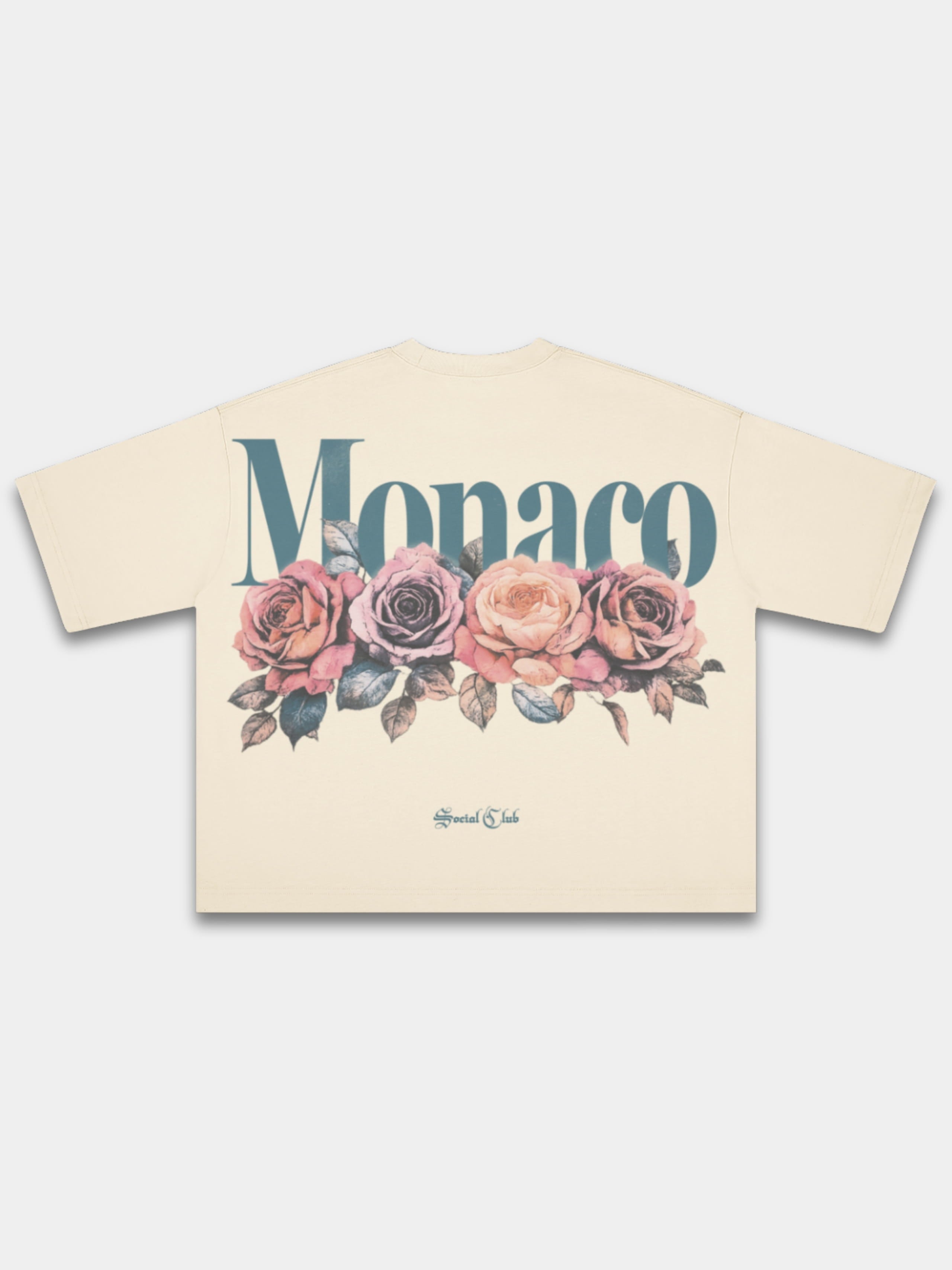 Ivory Bloom boxy tee by Monaco, back view with blue-green wordmark above four faded roses.