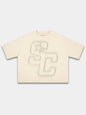 Ivory Club boxy tee by Monaco, front view with faded beige SC monogram and star graphic.