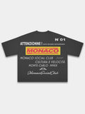 Monaco Trackside black boxy tee, back mockup with yellow MONACO panel and racing typography.