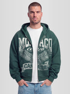 Man Wearing The Authentic Club Heavyweight Full-Zip Hoodie in Pine Green — Monaco Social Club streetwear