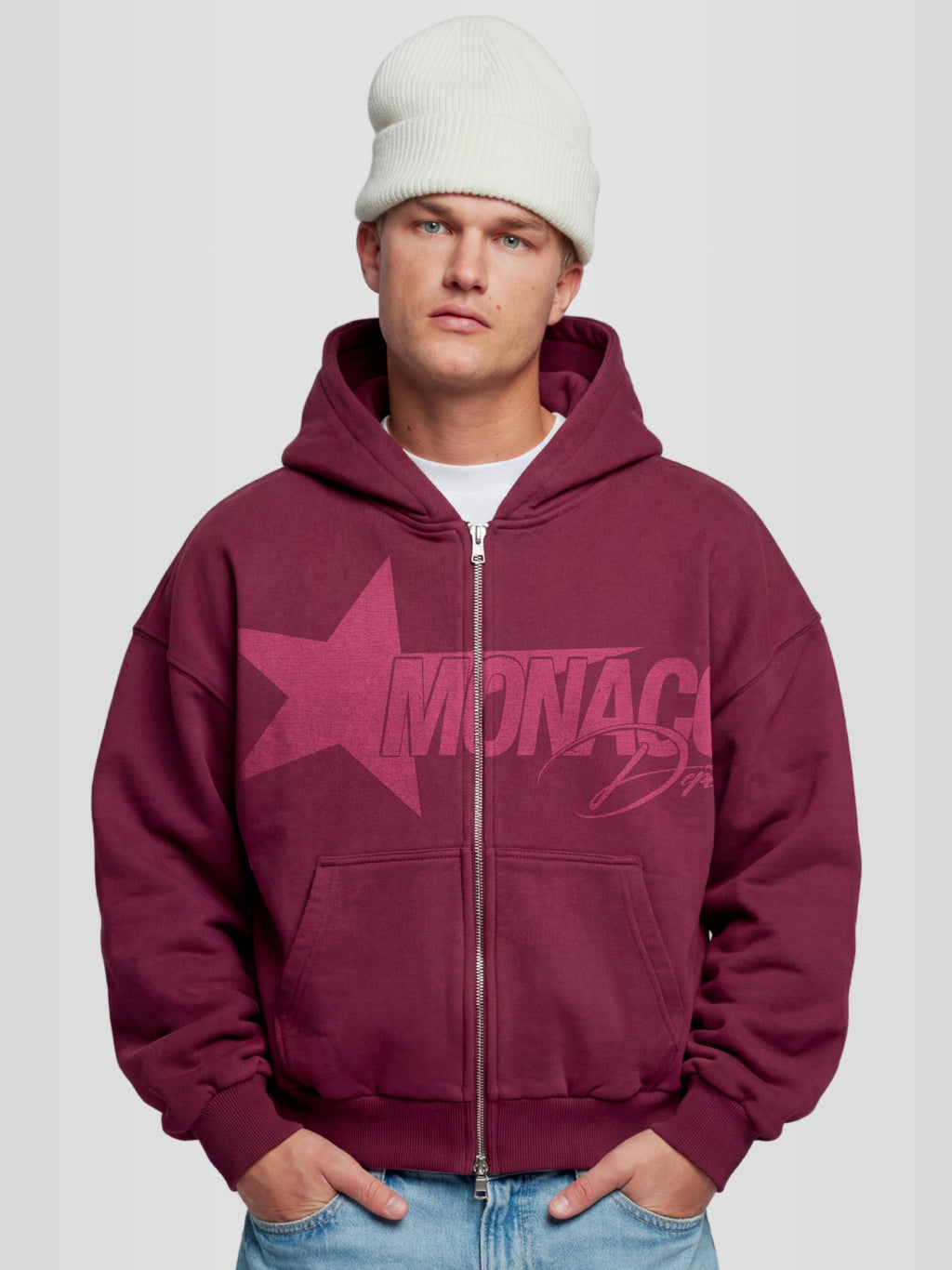 Men model wearing the Monaco Dept. Heavyweight Full-Zip Hoodie in color merlot — Monaco Social Club streetwear.