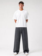 White Monaco 280 GSM paneled shirt worn by model, front view with oversized fit and drop shoulders.